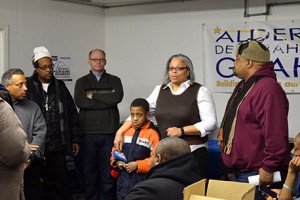 Ald. Graham waits with her grandson Terry and other supporters for the results of Tuesday night's election. (Photo/T.J. Kremer)