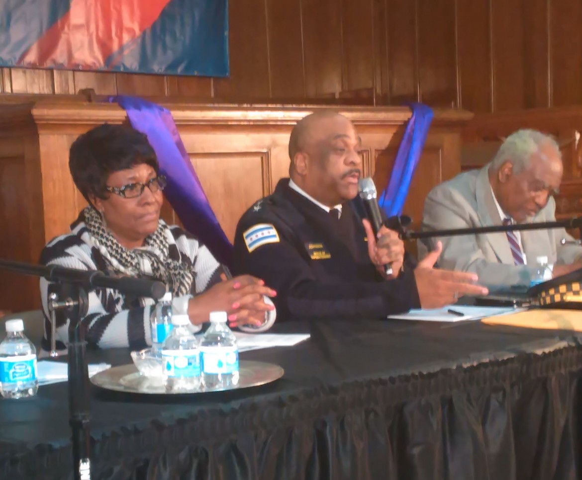 37th Ward Ald. Emma Mitts (left) and Congressman Danny Davis (right) join Police Chief Eddie Johnson at Wednesday's town hall in Austin. 